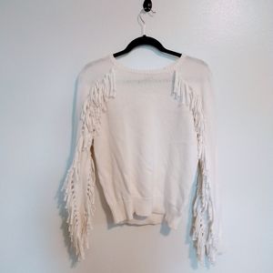 Denim fringe knit sweater with 2 rows of fringe on the arms.  Size small